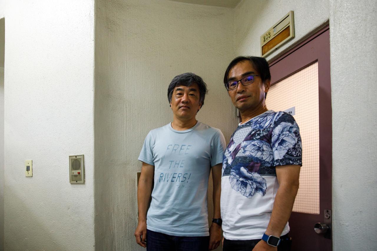 BPw社の中多広志社長（左）と、坂尻浩孝執行役員