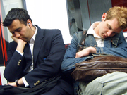 電車で寝る人