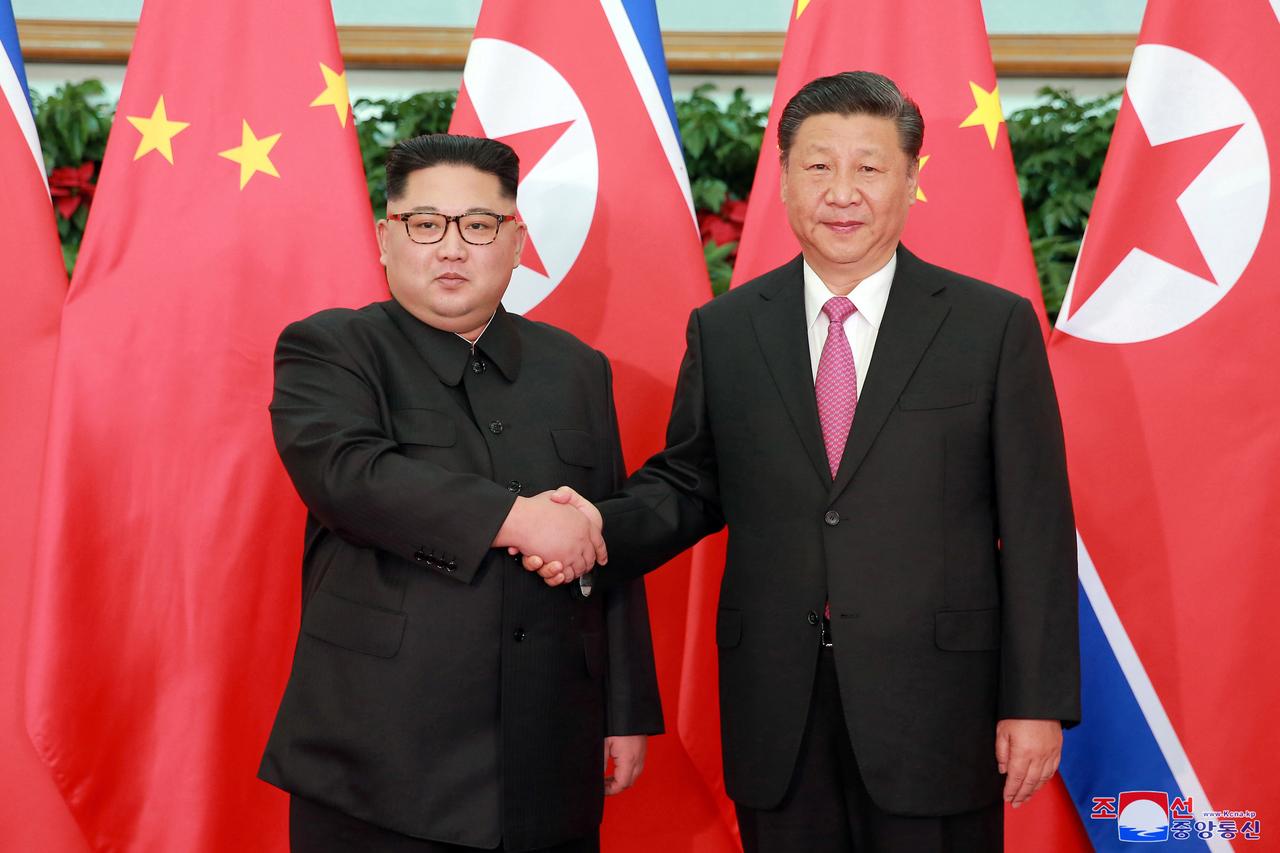金正恩朝鮮労働党委員長と習近平国家主席の会談