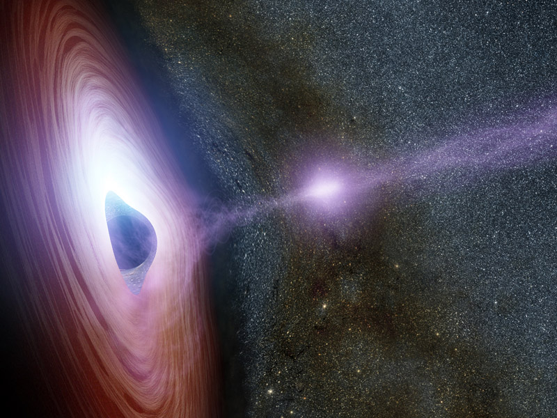 超大質量ブラックホールと落下する物質が渦巻く降着円盤の想像図。