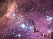 ハッブル宇宙望遠鏡が捉えた大マゼラン雲の一部。明るい色のガス雲が崩壊して新しい星を形成している。