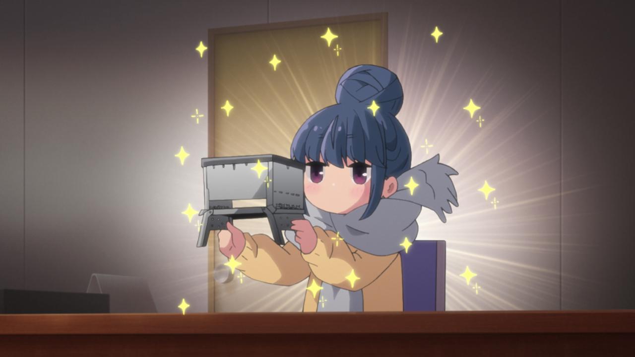 リンが新しいキャンプグッズ（コンパクト焚火グリル）を手に｢買っちった｣とつぶやくシーン。