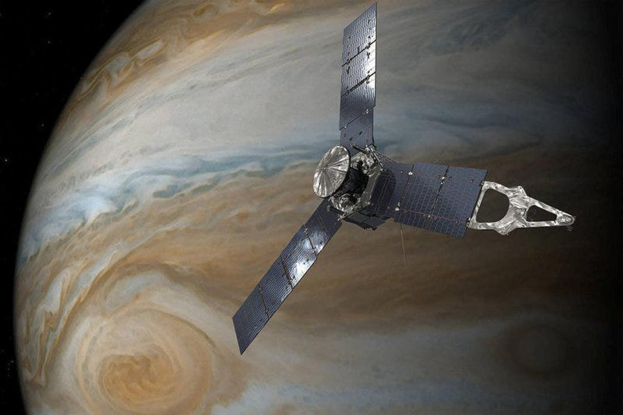An illustration of NASA's Juno spacecraft in orbit around Jupiter.