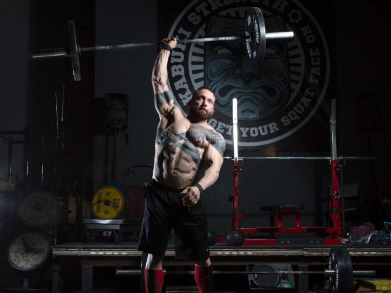 Chris Duffin, a world record holding power lifter, said strength training beginners can make quick progress on muscle building, with the right strategy.