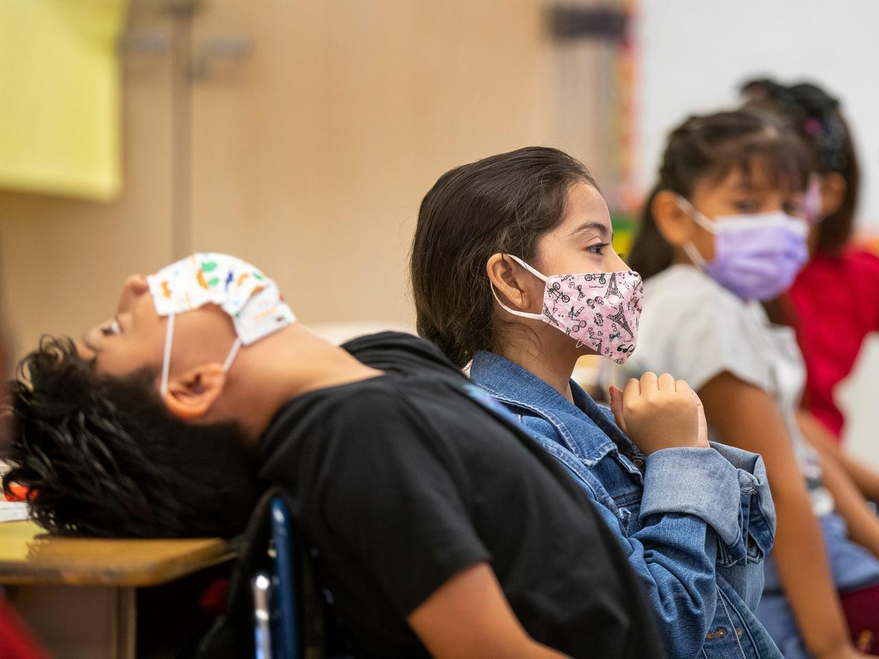 Kids in masks returning to school