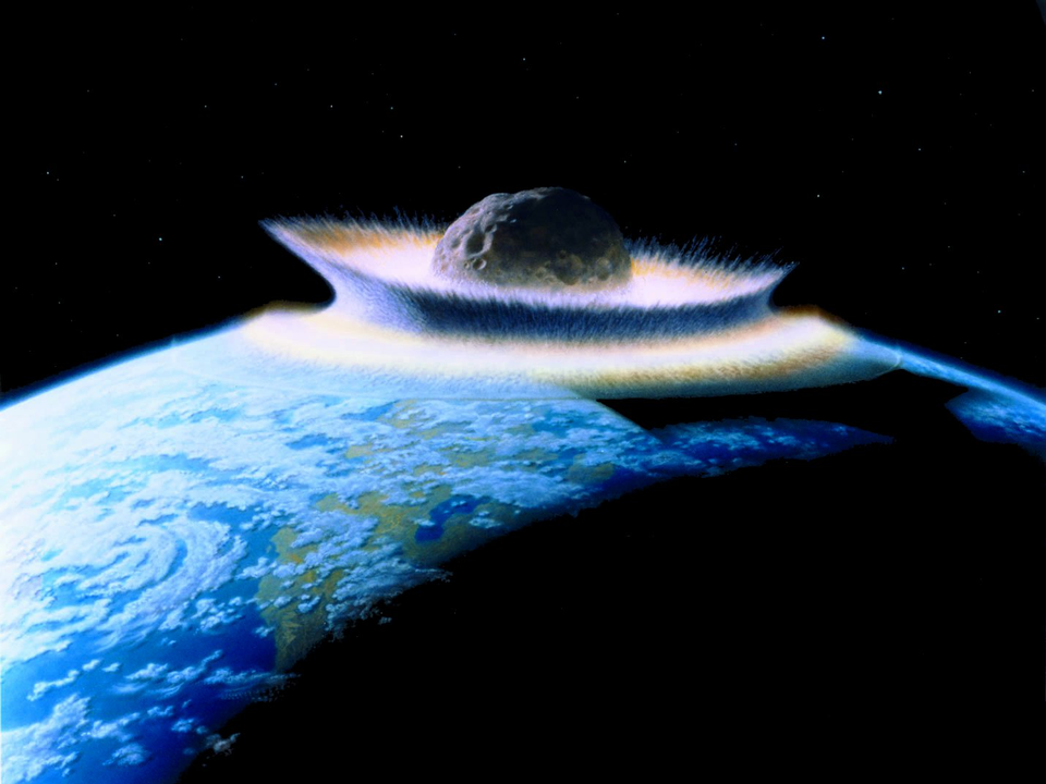 地球に惑星がぶつかる写真