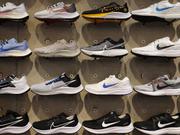  Shoes line the shelves at the Nike store on December 21, 2021 in Miami Beach, Florida.?