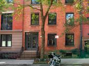 The house has a red-brick facade