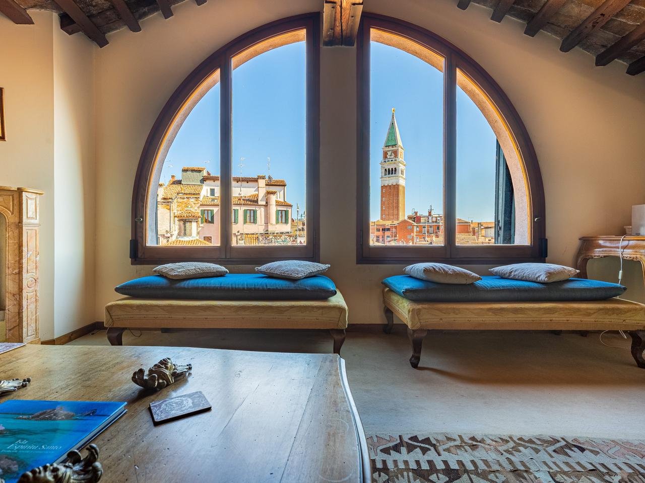 The penthouse overlooks the famous Piazza San Marco.