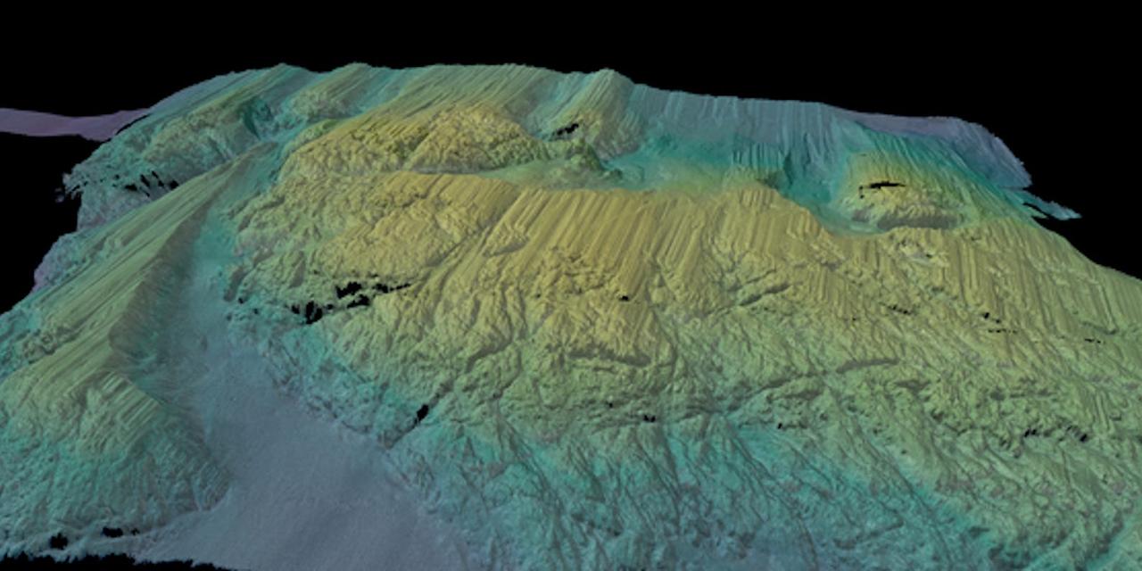 3D image of topographic data from the ridge just in front of the Thwaites Ice Shelf collected by the Rán de Kongsberg HUGIN autonomous underwater vehicle, colored by water depth.