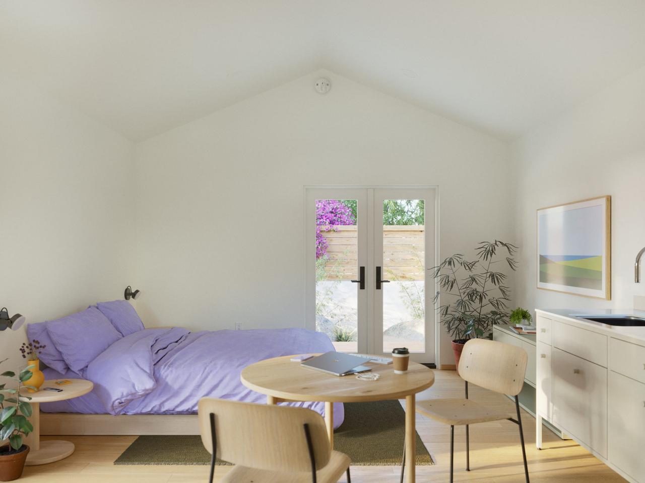 紫のベッドとテーブル