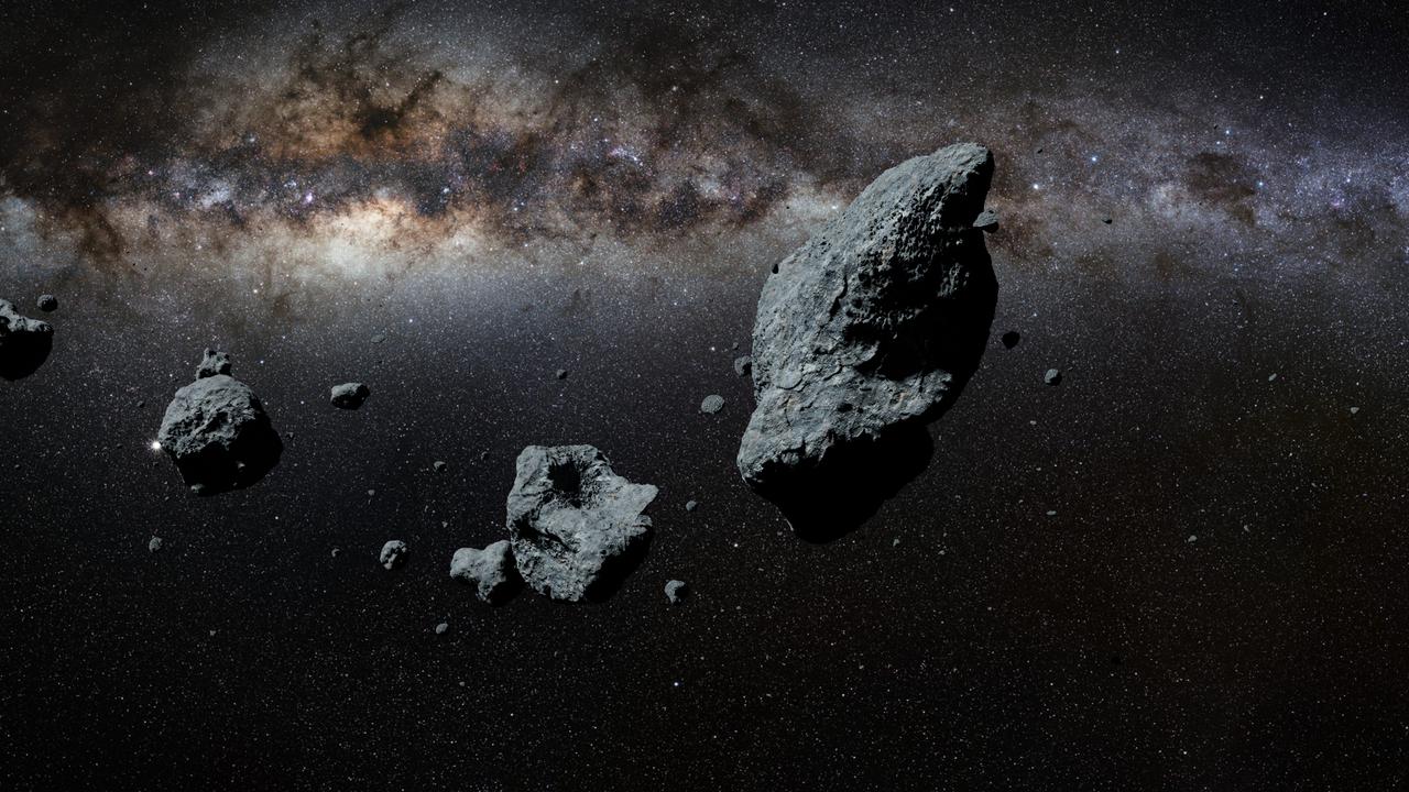 宇宙空間を漂う小惑星のイメージ。