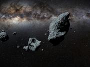 宇宙空間を漂う小惑星のイメージ。