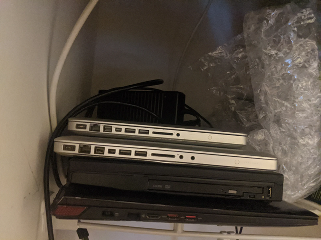 20201207stack_of_laptops