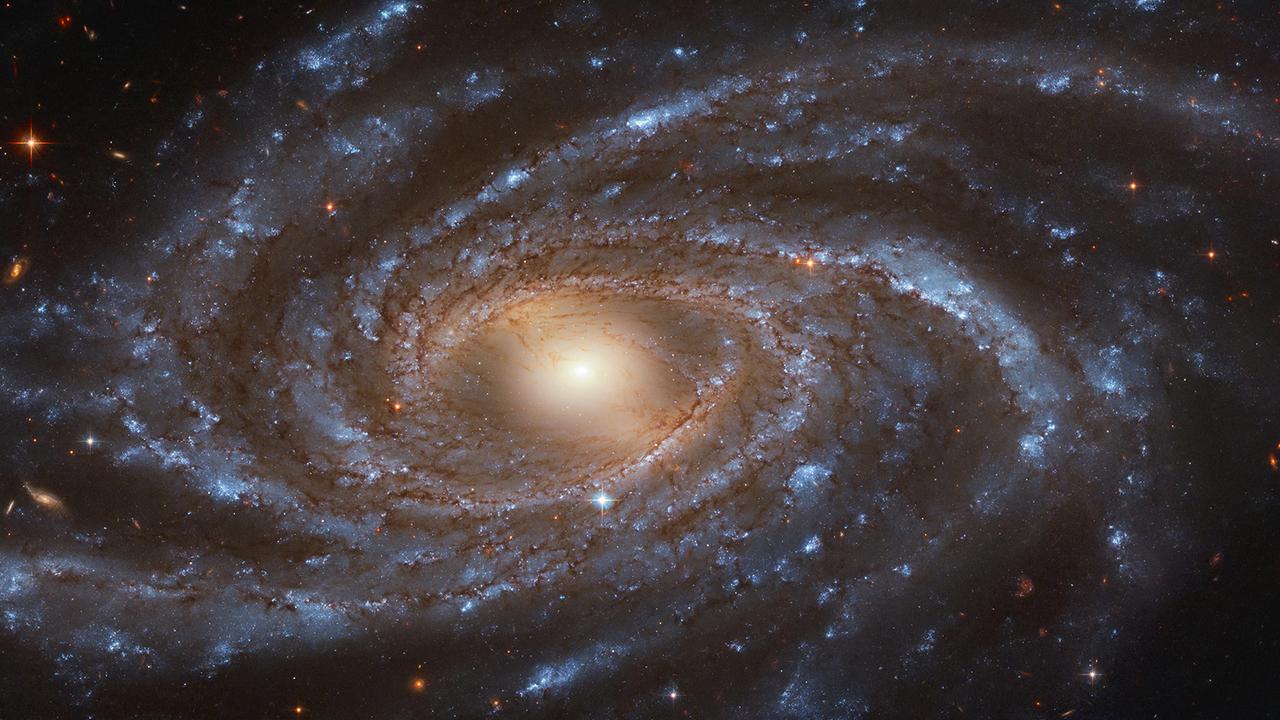ハッブル宇宙望遠鏡がとらえた銀河が、この世のものとは思えないほど美しい…