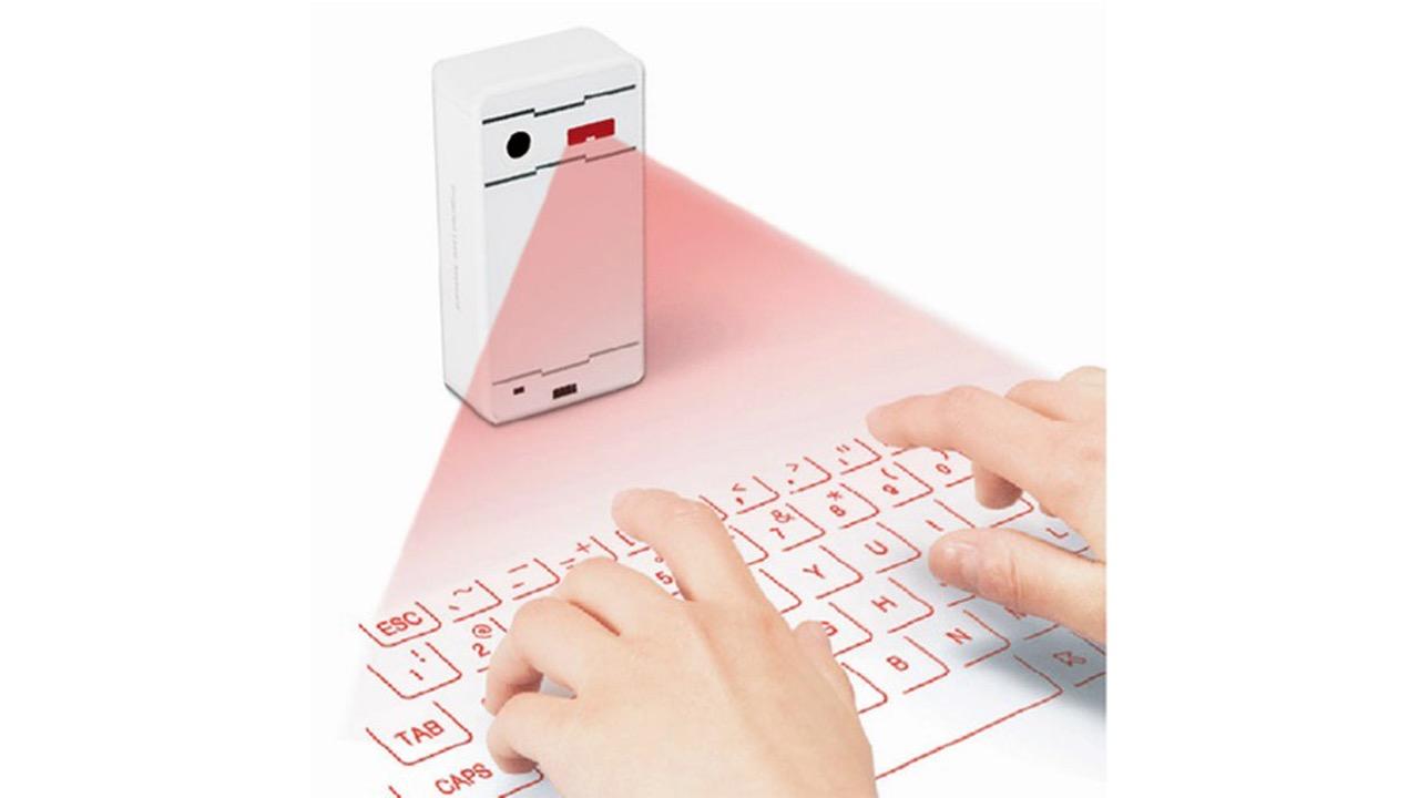 レーザー光バーチャルキーボード 目の前にキーボードが浮かび上がるレーザー光バーチャル