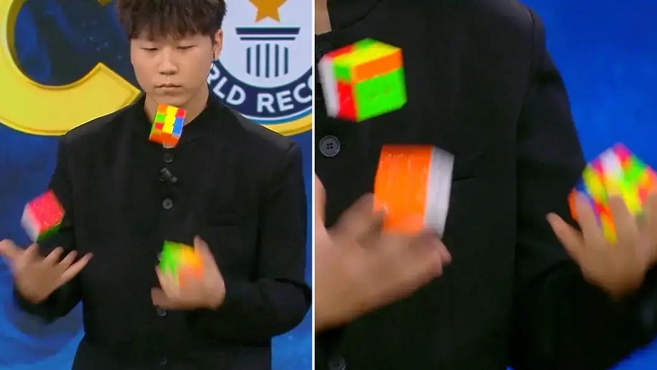 ジャグリングしながら3つのルービックキューブを解く青年、世界記録！