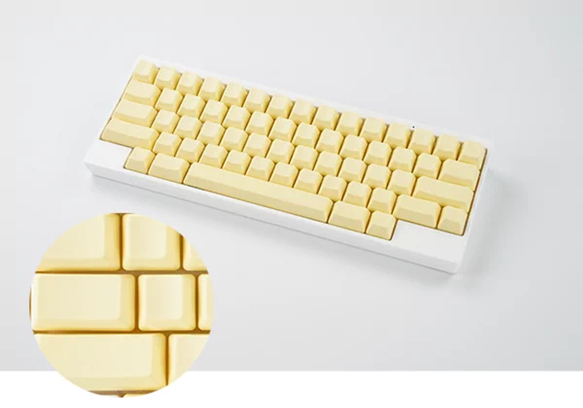 カラフルなHHKBキートップ。春は蒲公英（たんぽぽ）色に染まります 