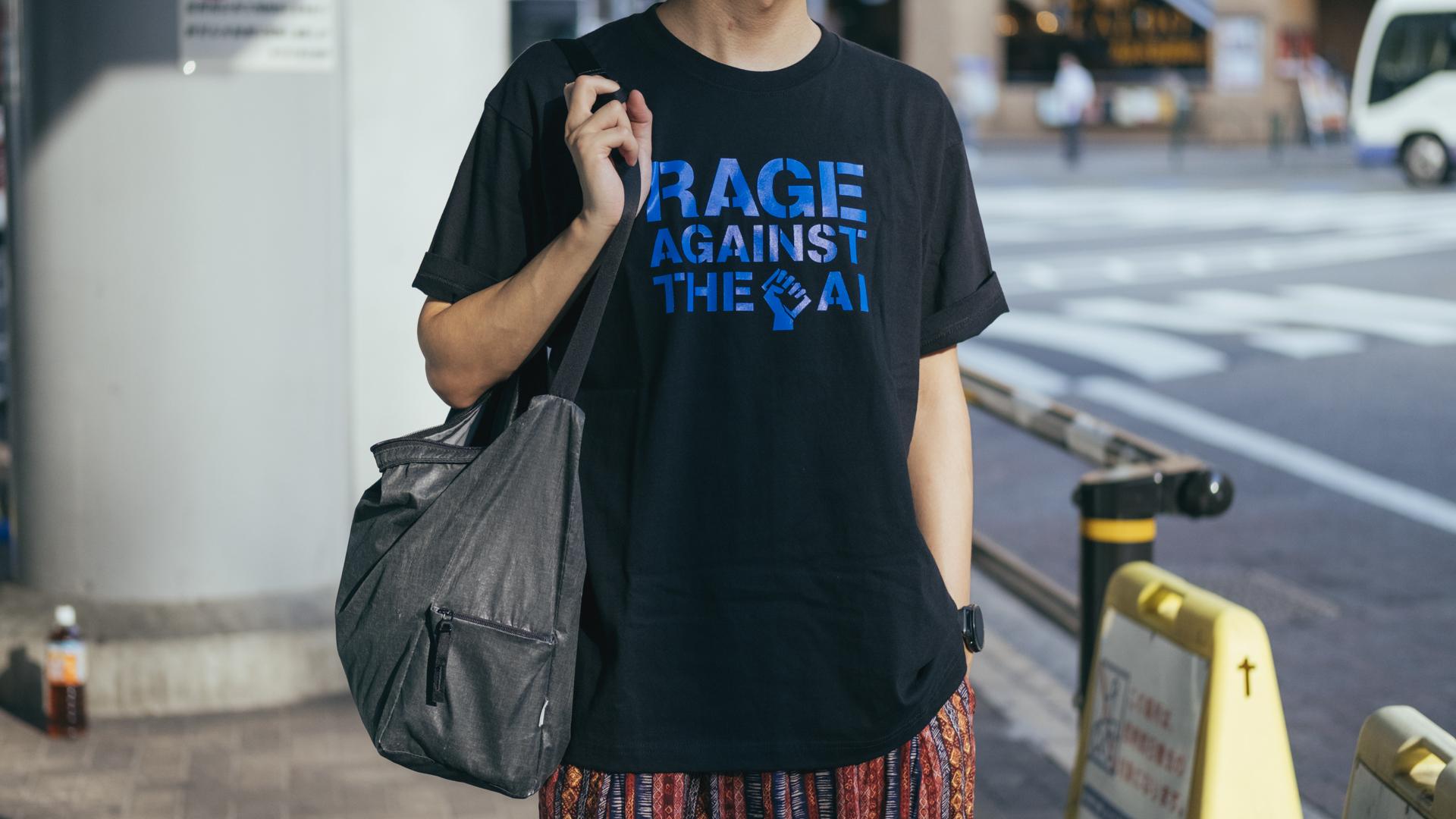 AIに対するアンビバレントな思いがこもったTシャツ