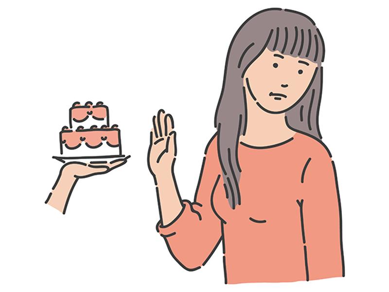 ケーキを断る女性のイラスト