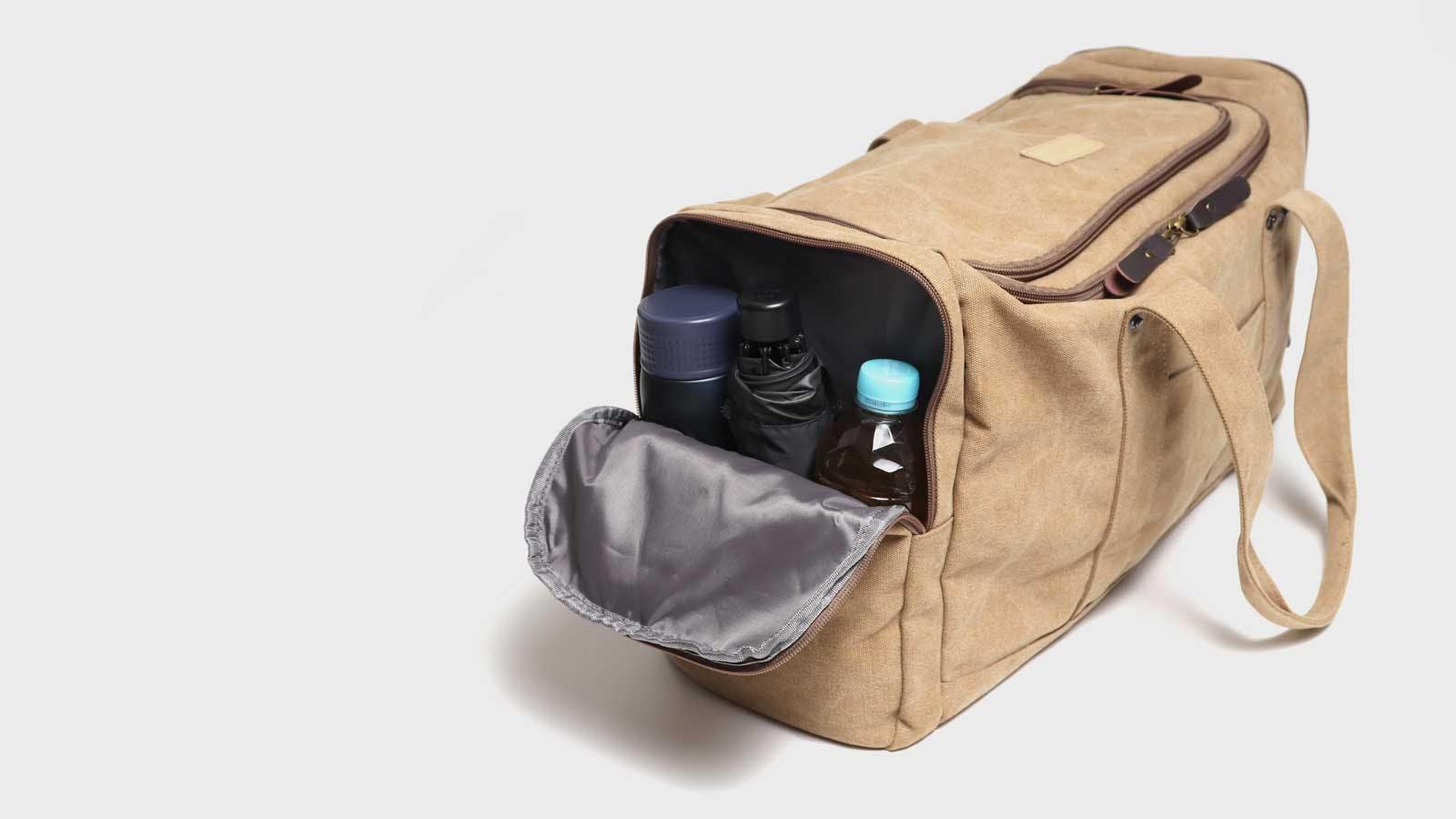 7ポケット完備のフルオープン式。BOX型帆布ボストンバッグで旅の達人に