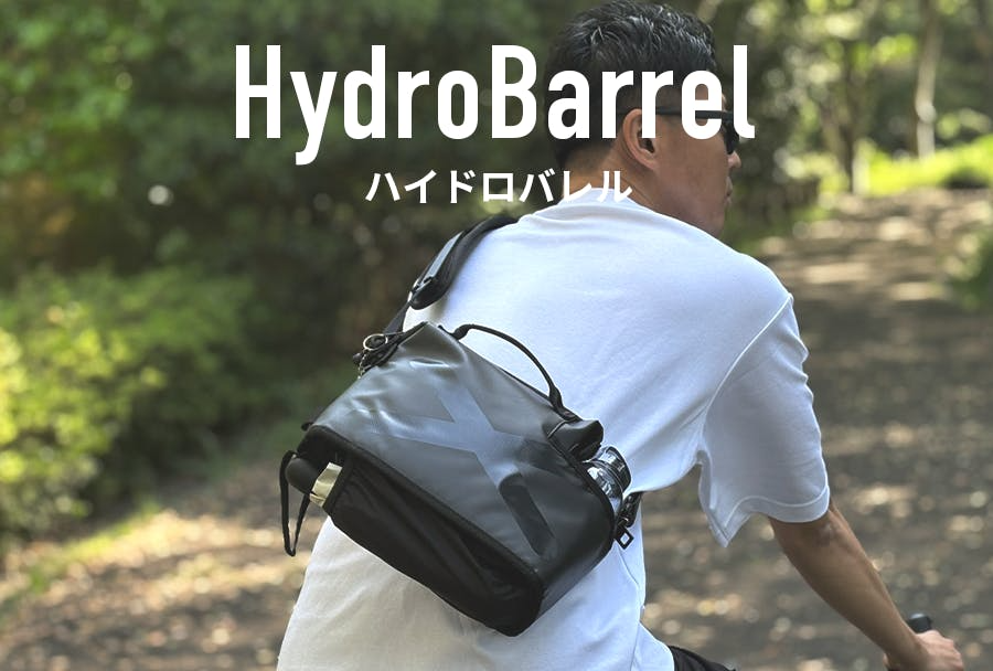 HydroBarrel 撥水ボディバッグ 　ショルダーバッグ 1秒で、その手は自由に。」飲み物も濡れた傘も“持たない選択を” 海外で