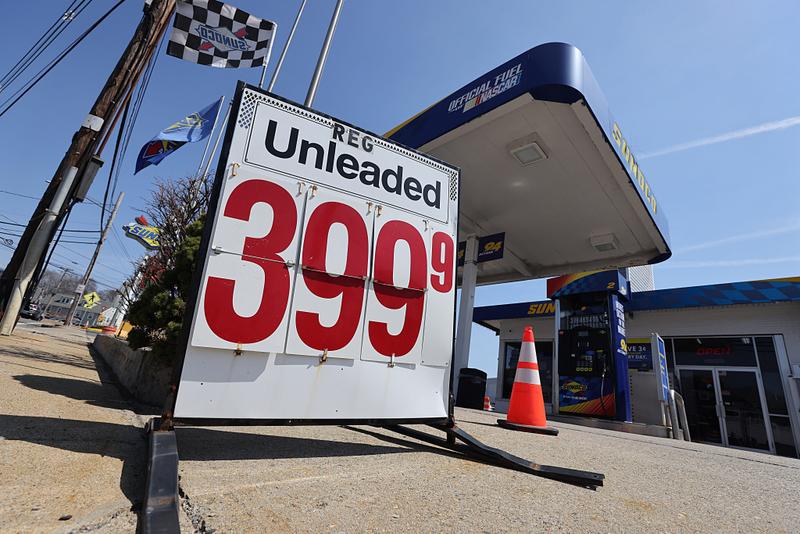 Sign showing the price of unleaded regular gas