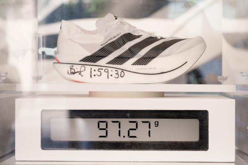 The Adidas Adizero Adios Pro Evo 3 that Sabastian Sawe wore during the 2026 London Marathon is placed on a weighing scale.
