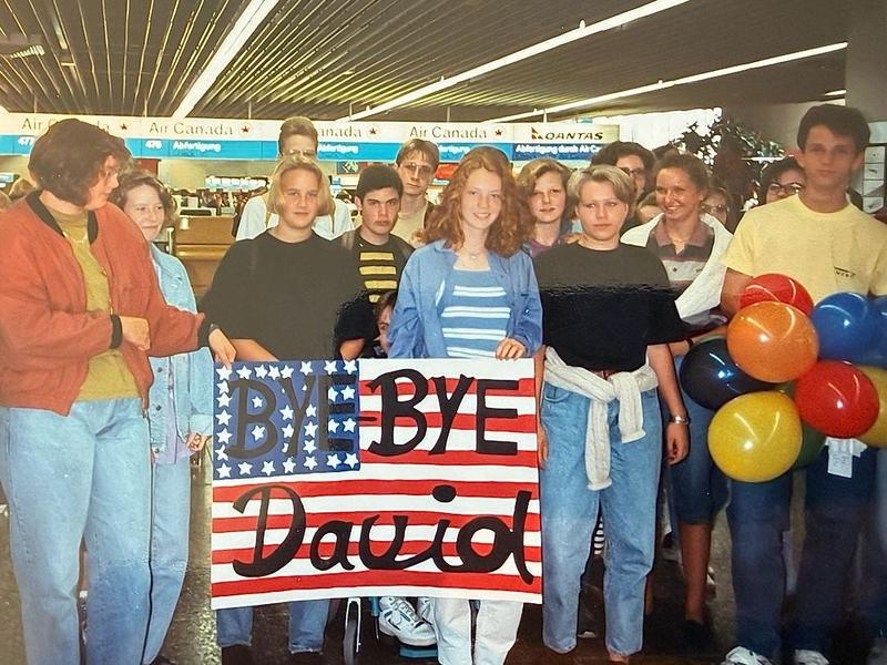 David Von Rosen by a "bye bye" sign.