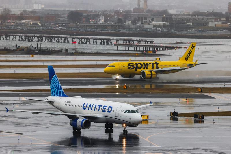An Airbus A320 passengers aircraft of Spirit airlines arriving from Miamia is pictured while an Airbus A319 of United airlines arrived from Denver are seen at La Guardia Airport on January 9, 2024.