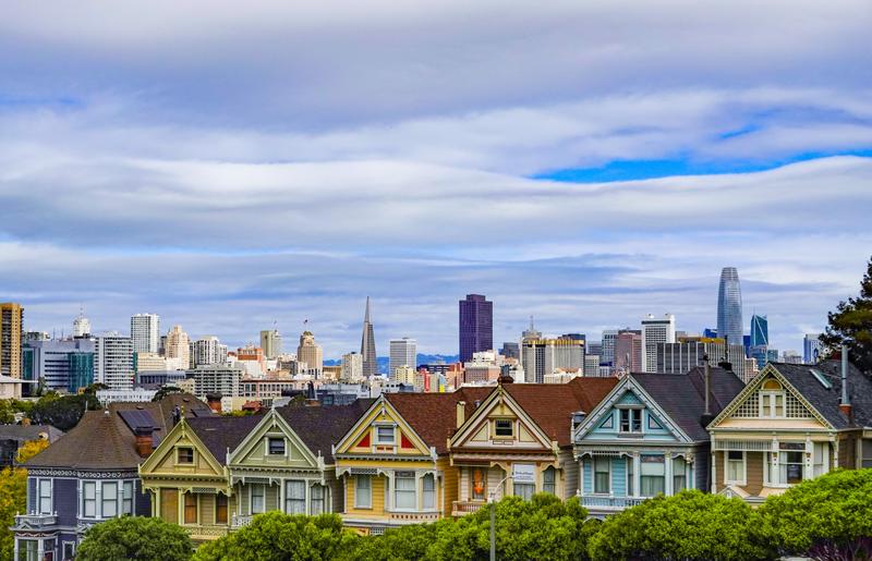 The "Painted Ladies" of San Francisco with the skyline in the background. Newly minted AI millionaires are driving up prices.