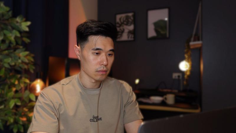 Jeremy Lim sitting at his computer