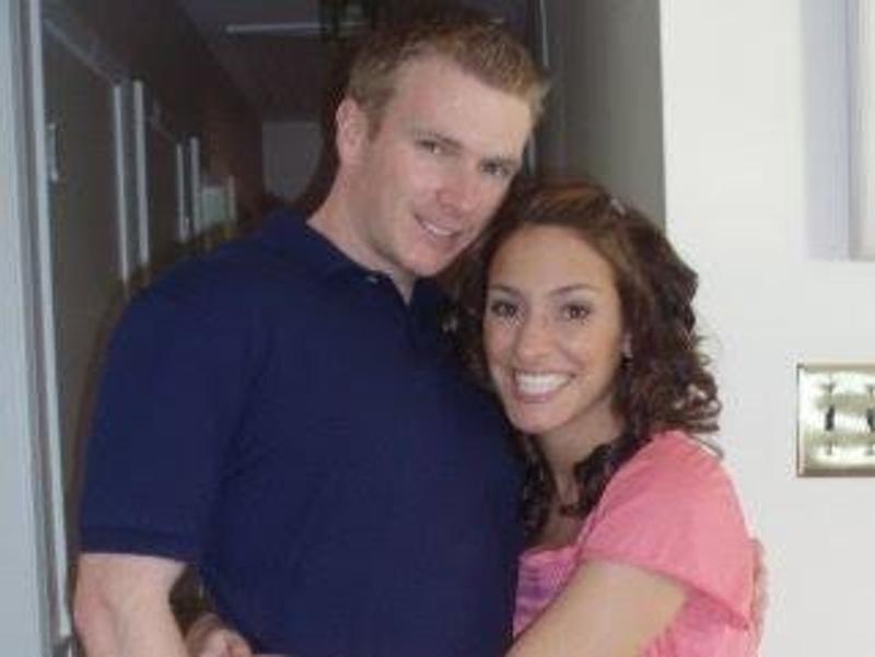 Couple posing for photo