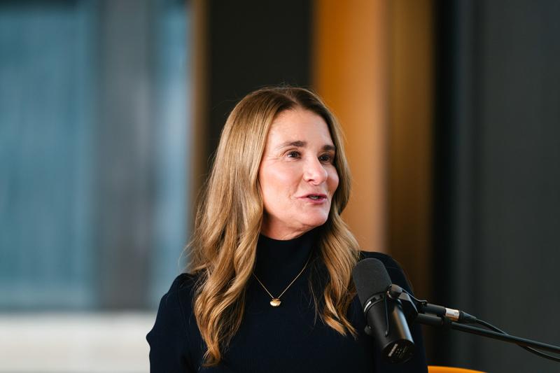 Melinda French Gates talks into a black microphone.