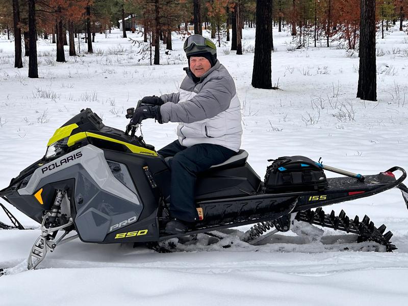 John Adams on snowmobile