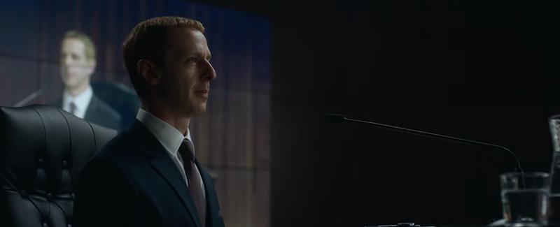 Jeremy Strong sitting in front of a microphone in The Socal Reckoning movie