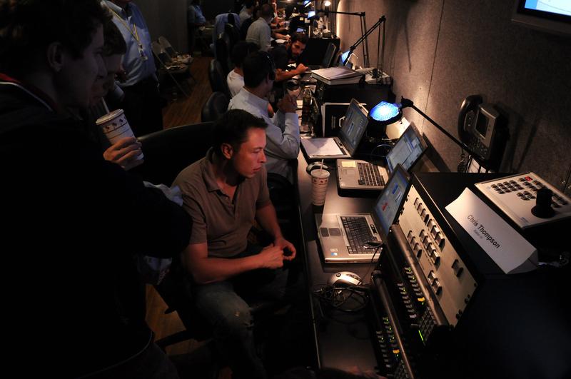 Elon Musk sits at a computer during the 2008 launch of the Falcon rocket.