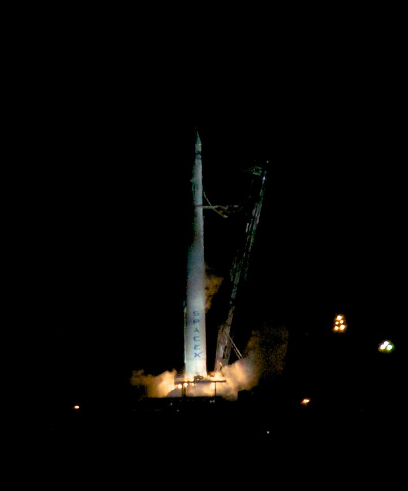The engines of a SpaceX Falcon rocket light up. The vehicle failed to launch from the pad.