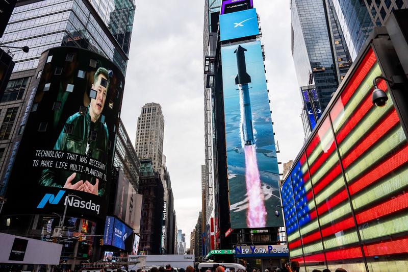 Elon Musk, founder of Space Exploration Technologies Corp. (SpaceX), on screen during the company's initial public offering (IPO) at the Nasdaq MarketSite in New York, US, on Friday, June 12, 2026. SpaceX has made history with the biggest-ever IPO, launching it into the top ranks of the largest public companies and putting founder Elon Musk on the verge of becoming the worlds first trillionaire.
