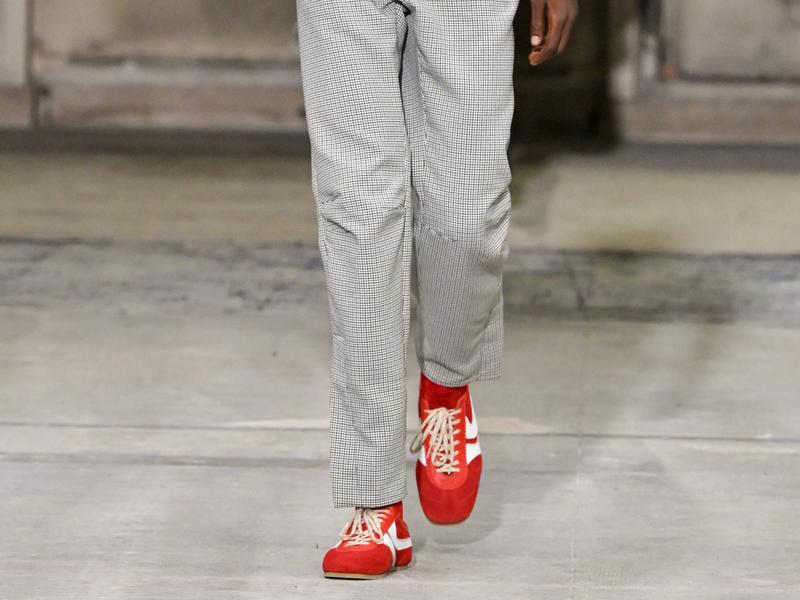 A model walks the Dries Van Noten runway during Paris Men's Fashion Week 2025.