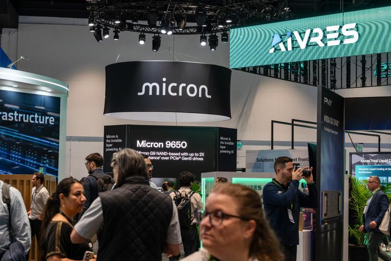 Micron sign at a crowded event