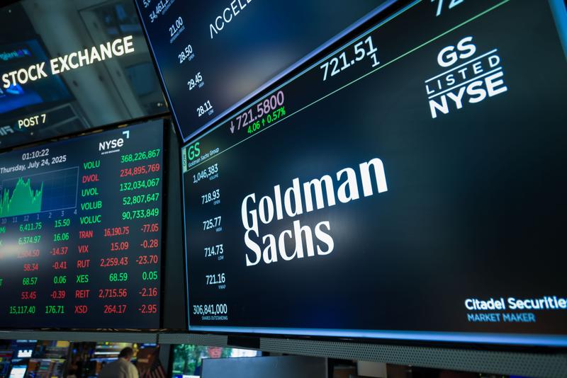 A Goldman Sachs sign on the floor of the New York Stock Exchange.