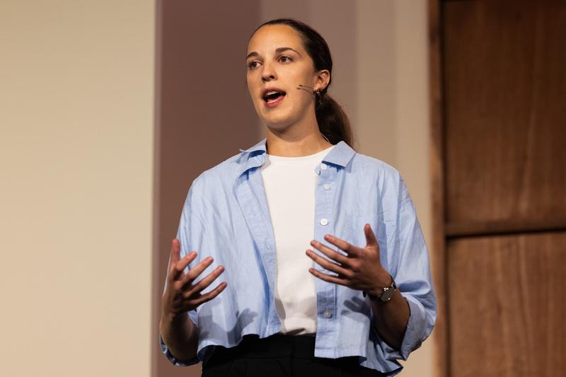 Katelyn Lesse, head of platform engineering at Anthropic, speaks at a conference.